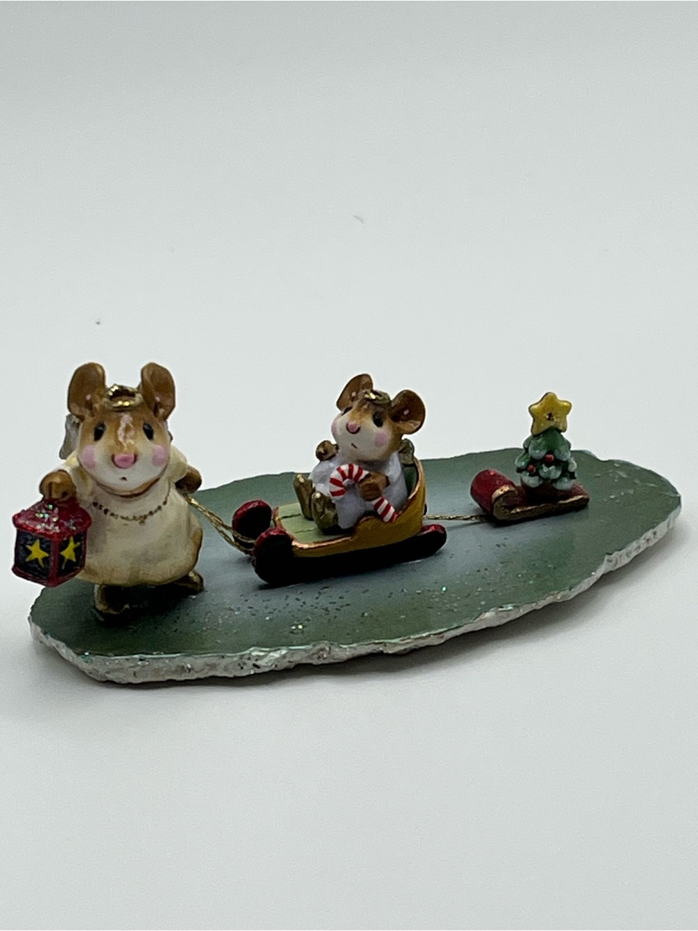 "Lighting the Way" (Model M-262) from the highly collectible Wee Forest Folk